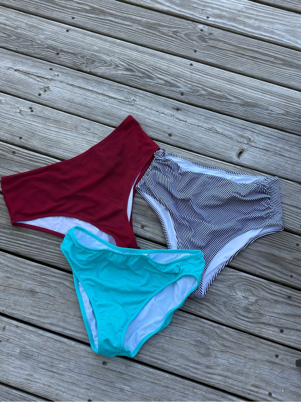 Three women’s swim bottoms size xl